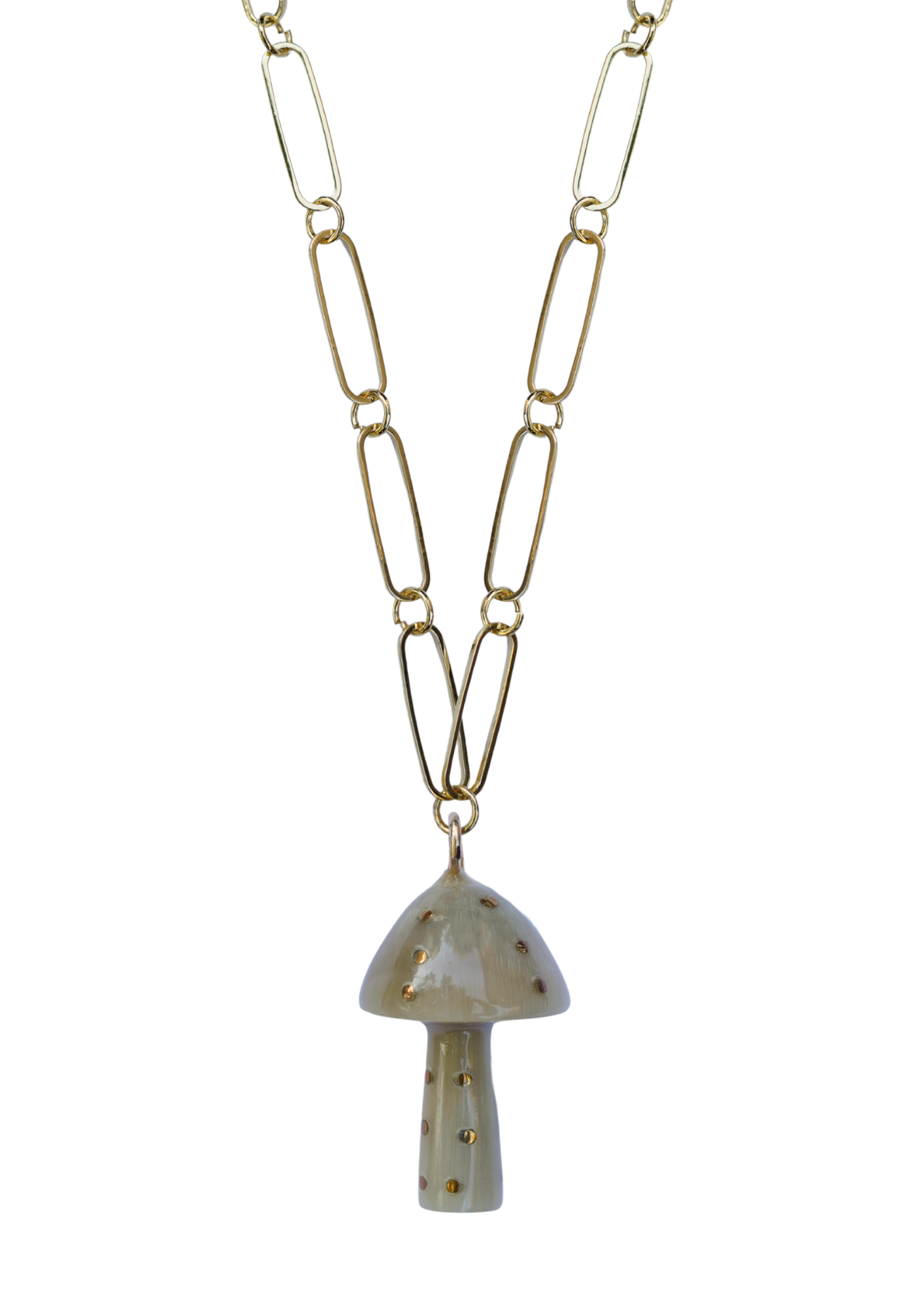 Gold paper clip necklace with a mushroom-shaped pendant on a white background