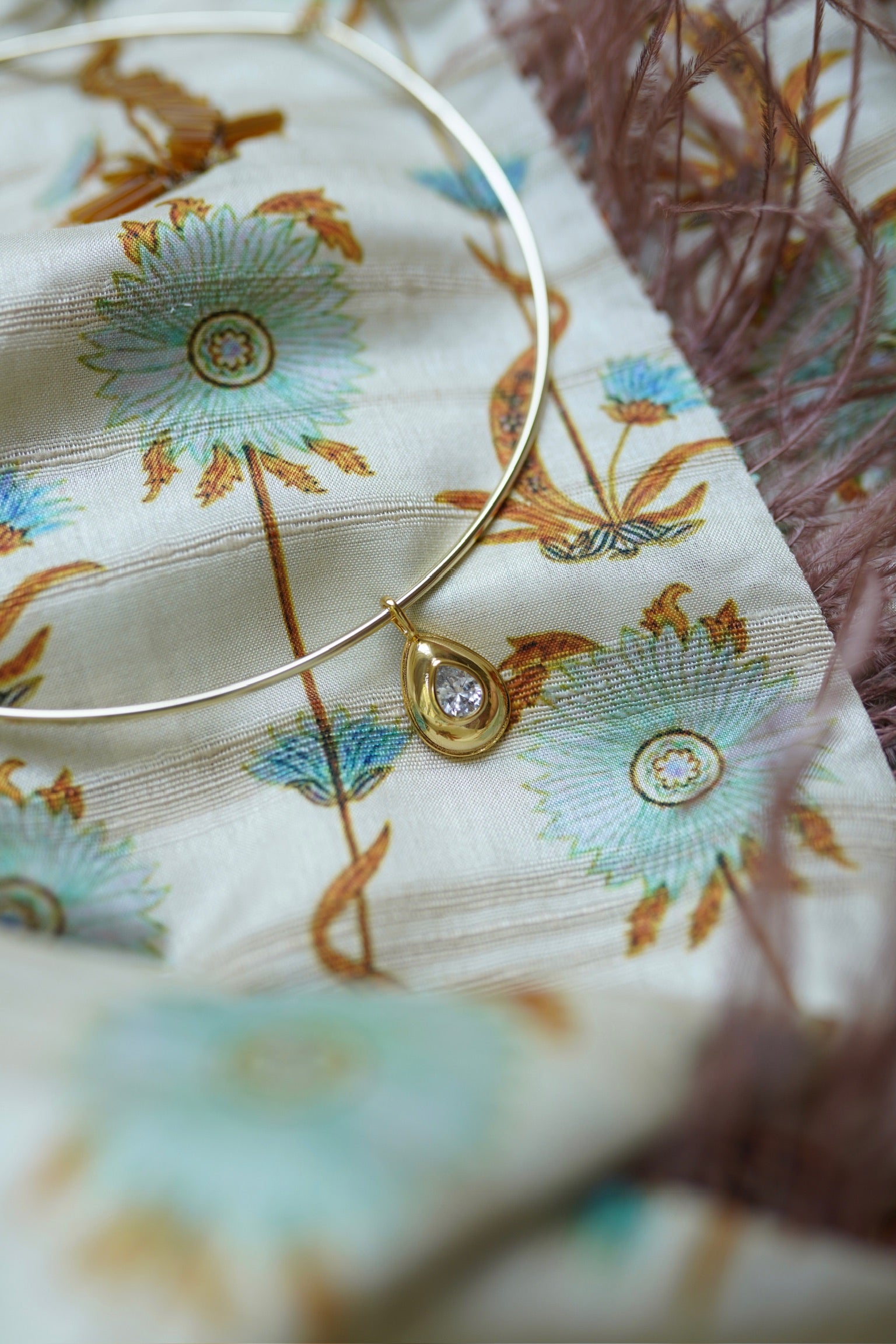 Golden Teardrop Bezel Charm