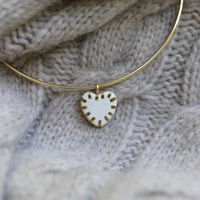 Heart Horn and Brass Charm