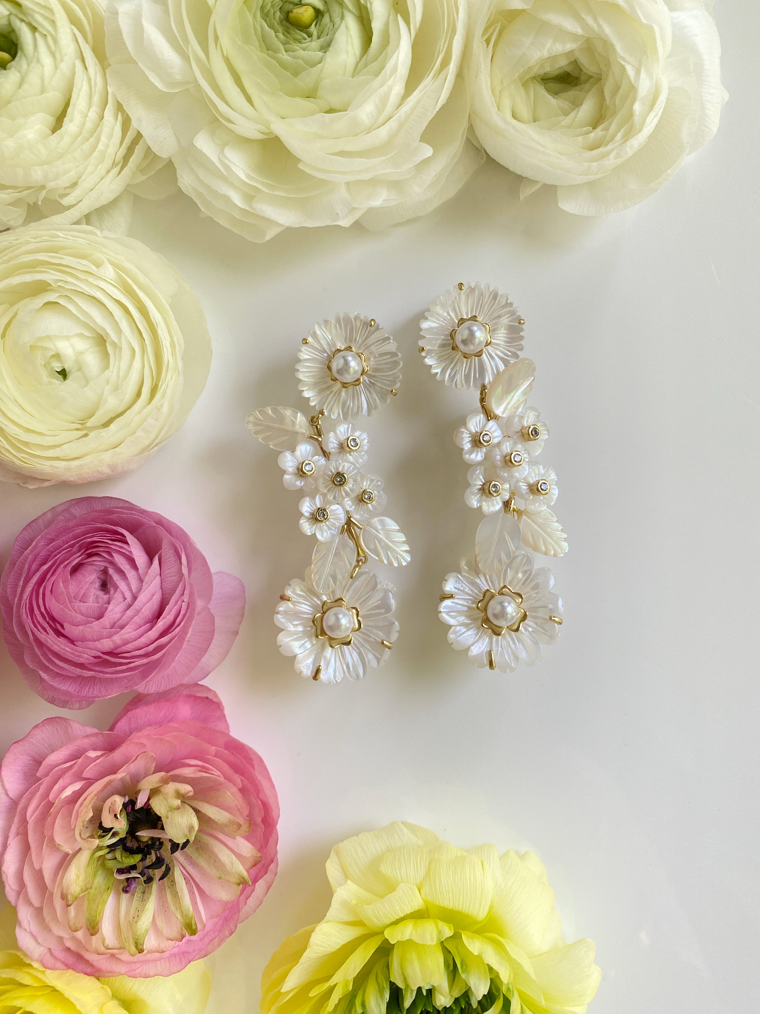 mother of pearl + flowers + pearl – Nicola Bathie