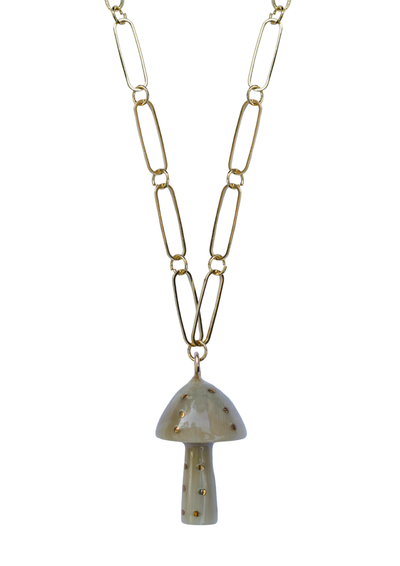 Gold paper clip necklace with a mushroom-shaped pendant on a white background