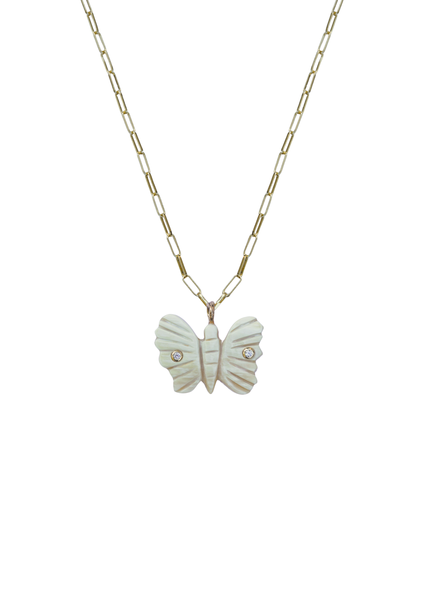 Butterfly pendant necklace on a thin chain against a white background