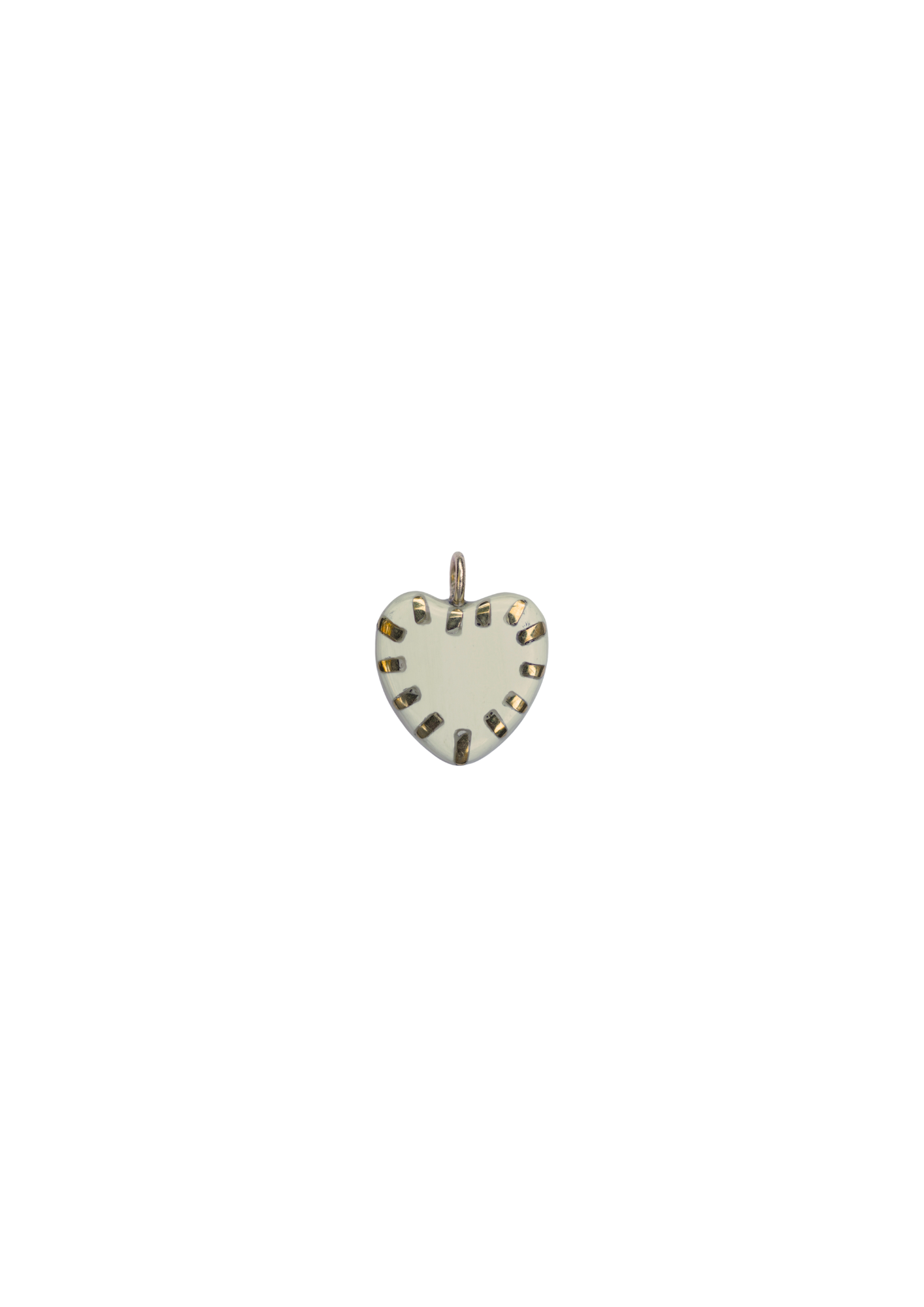 Heart-shaped pendant with brass or gold details on a white background