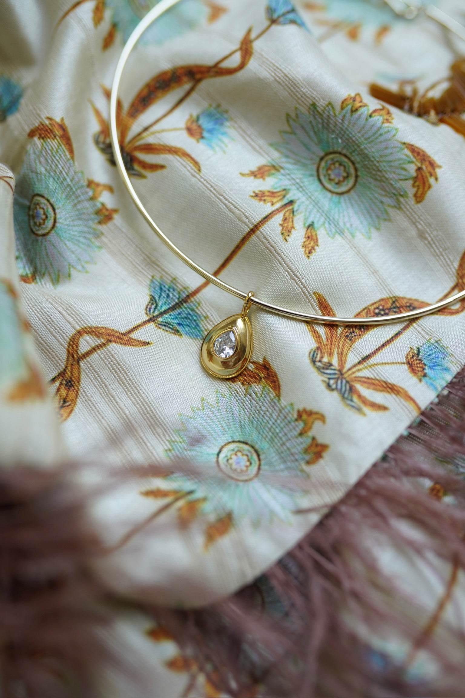 Golden Teardrop Bezel Charm