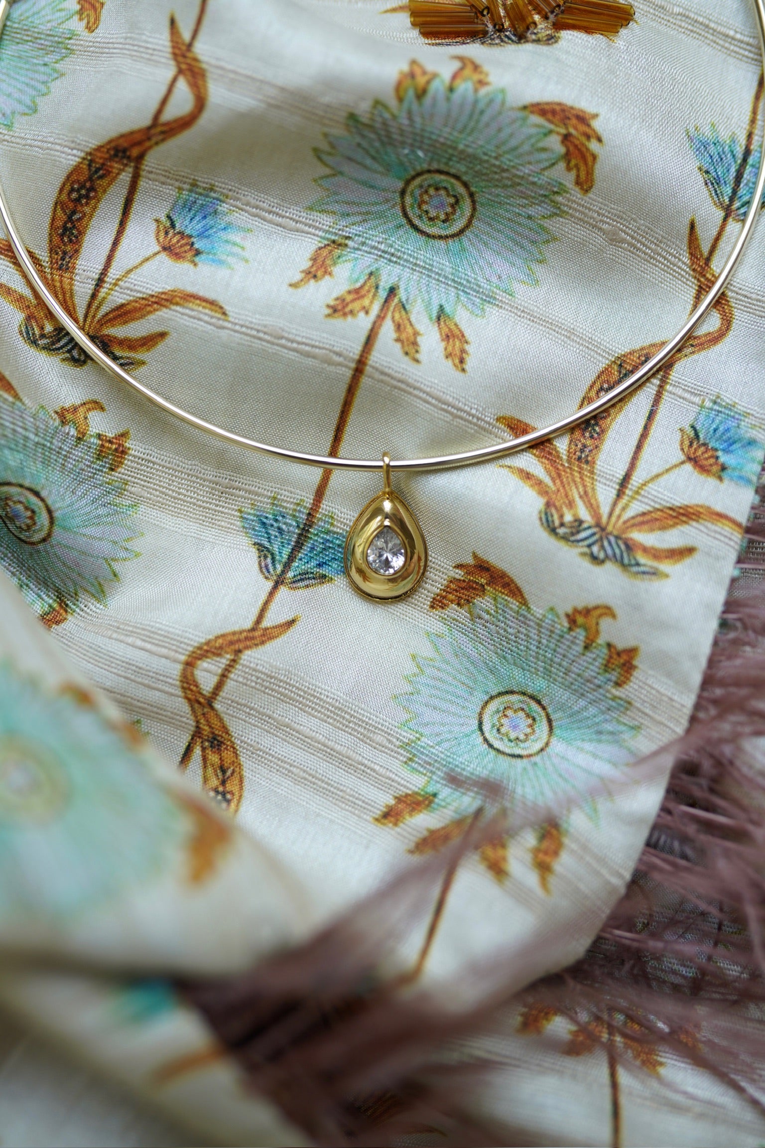 Golden Teardrop Bezel Charm