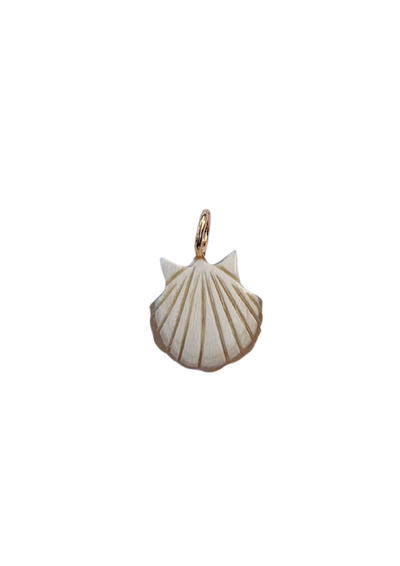 Sea Shell-shaped pendant with a gold chain on a white background
