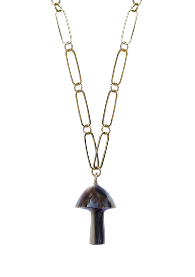 Gold paper clip style chain necklace with a black mushroom pendant on a white background