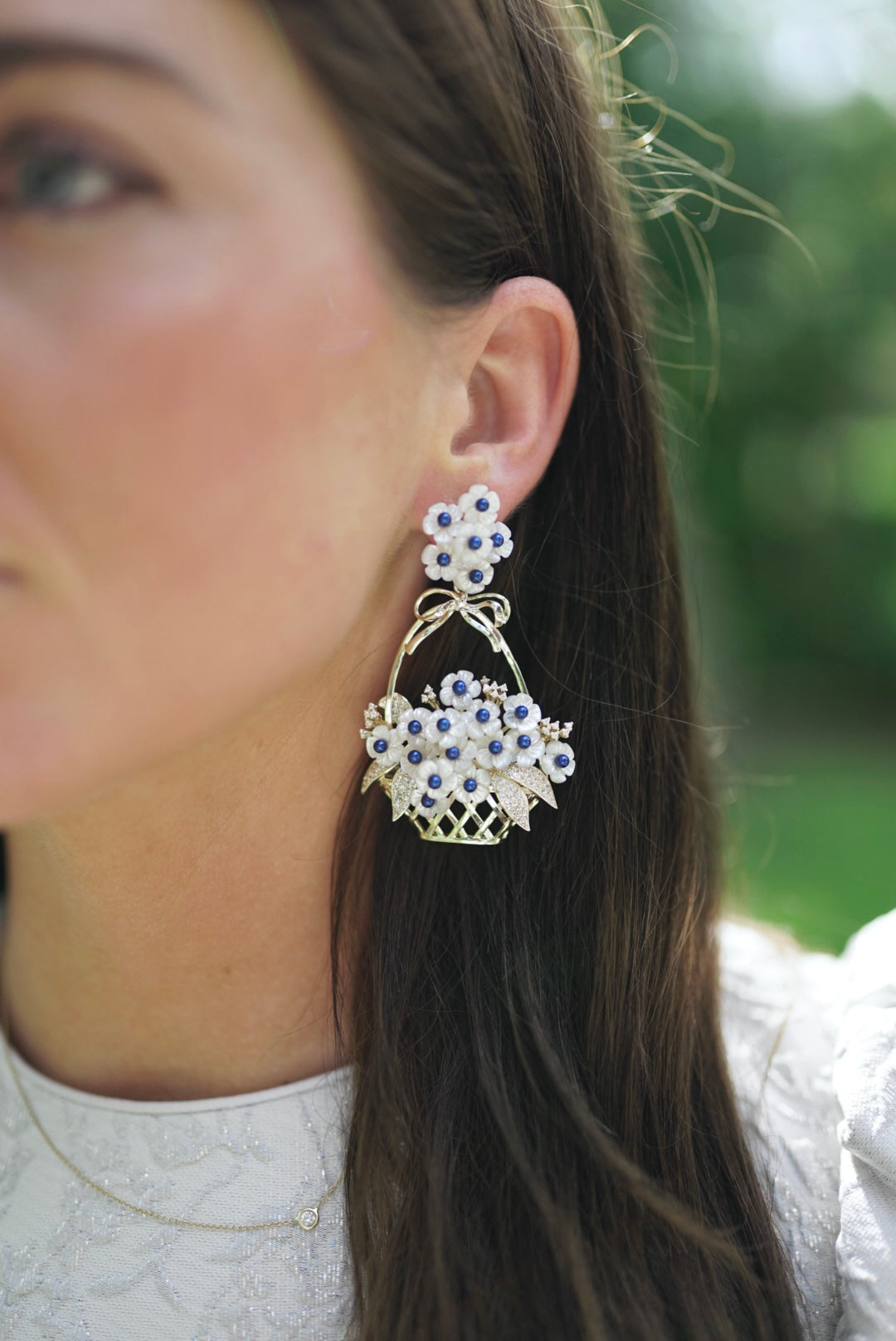 blue and white embellished mother of pearl flower basket