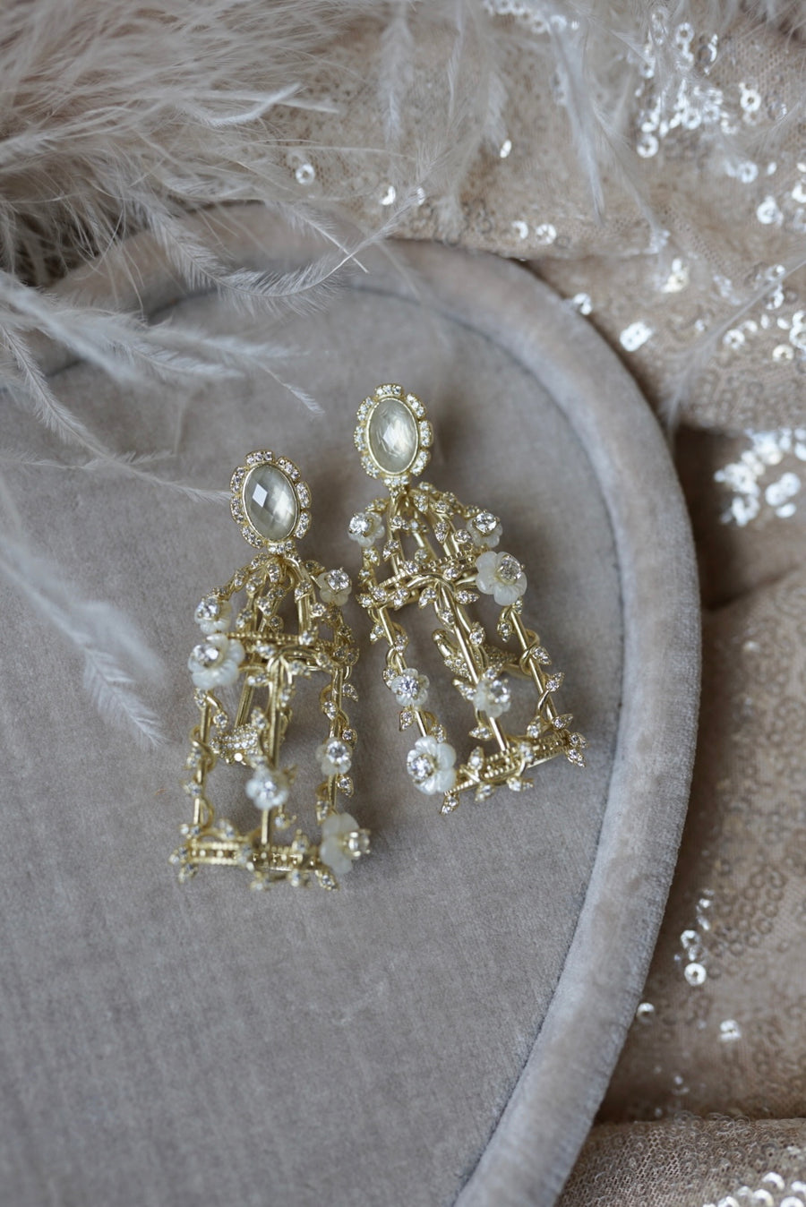 golden embellished birdcage + mother of pearl