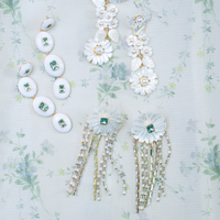 mother of pearl + quartz + embellished tassels