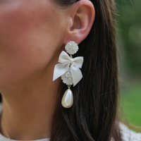 embellished mother of pearl + ivory bow